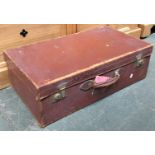 A vintage leather suitcase, canvas lined, 71cmW; together with one other similar the top marked 'P.F