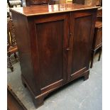 A George III gents hanging wardrobe, enclosed by two panelled doors, on bracket feet, 111x61x133cmH