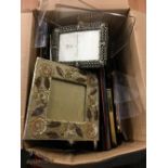 A large quantity of contemporary picture frames