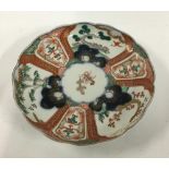 A Japanese Imari plate, sen-gaki pattern, heightened in gilt, made in Hizen region, 21.5cmD