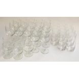 A set of 17 good wine glasses; together with a set of 11 water glasses etc