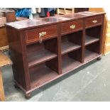 A reproduction mahogany sideboard with three drawers and shelves below, 153x36x86cmH
