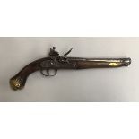 A flintlock pistol, with brass and base metal hardware, flint present