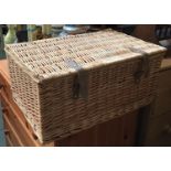 A wicker picnic hamper