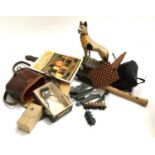 A mixed lot of items to include chalk ware dog, 35mm Nikon camera, tin box containing buttons,