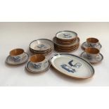 A French stoneware Pornic 'Coclane' dinner service, including teacups, saucers, sideplates, dinner