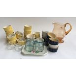 A mixed lot of ramekins, glass jug and small quantity of cutlery