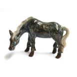A studio pottery figure of a horse