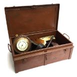 A tin travel trunk 61cmW, containing a small quantity of tack, brushes, barometer etc