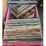 A mixed box of vinyl lps to include Beatles (1967-70), Sky, UB40, Grace Jones, Donovan, Ultravox,