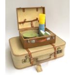 A Coracle picnic case containing a small quantity of Melaware melamine tableware; together with