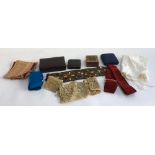 A small collection of jewellery presentation boxes, several bejewelled belts, lace etc