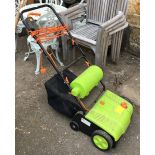 An electric lawn raker and scarifier