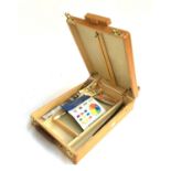 A Winsor & Newton easel paint box, with paint