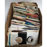 A mixed lot of 7" vinyl rock and pop singles to include Wham, UB40, Genesis, Eurythmics, The