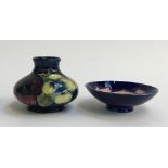 A Moorcroft vase, pansy design, approx. 6.5cmH; together with a small Moorcroft dish, peony design