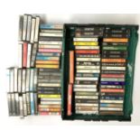 A mixed box of rock and pop cassettes including Gary Moore; Status Quo; Petshop Boys; Dire