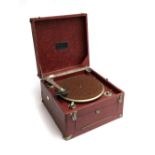 The Wonder Portable Brunswick Cliftophone gramophone; together with three suitcases of 78s including