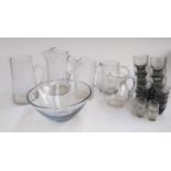 A mixed lot of glass to include jugs, bowl, shot glasses etc