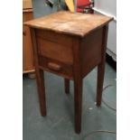 An early 20th century mahogany bedside cabinet/sewing box, hinged top over single drawer, 34x33x61