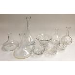 A mixed lot of glassware, to include to ships decanters and two others, tall glass vase, fruit
