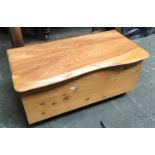 A modern sewing box, on casters, containing a very large quantity of bobbins, threads etc, 66cmW