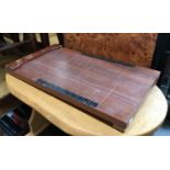 A shove ha'penny board, 61x33.5cm