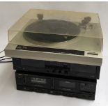 A Rotel RP-820 turntable; together with a Denon DRW-650 double cassette tape deck; and a Marantz