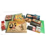 A mixed lot of vintage children's board games including scrabble, monopoly, ludo, various cards,