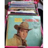 A mixed box of vinyl LPs to include Elvis Presley, Simon and Garfunkel, Spear Destiny, Status Quo,