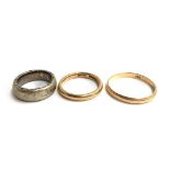 Two gold wedding bands, one 14ct 1.9g size S, other 9ct 2.7g size L plus one white metal band