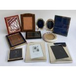 A mixed lot of various photo frames, to include a pair of oval plated frames, crocodile skin