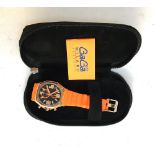 A GaGa Milano watch, in orange, with purchase receipt, in case