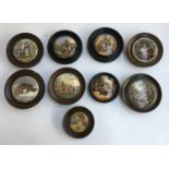 A collection of 9 Prattware pot lids, to include 'Hide and Seek', 'I See You My Boy', 'The Wolf