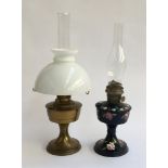 A brass oil lamp, with chimney and milk glass shade; together with a painted oil lamp with chimney