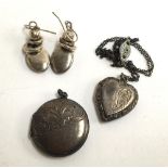 Two silver lockets one heart shaped, the other round together with a pair of drop earrings