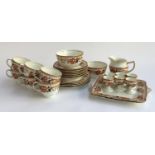 A Delphine china part tea set, to include, teacups (6), saucers (6), small plates (5), cake