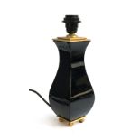 A Baccarat black glass and gilt lamp base, 33.5cmH to top of fitting