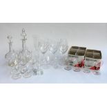 A mixed lot of glassware to include a number of engraved sherry and wine glasses, large wine