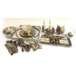 A mixed lot of plated items to include flatware, place card holders, cockerel statues (af) etc