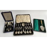 A cased set of silver plated dessert forks, spoons and serving spoon for six place settings;