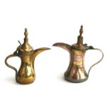Two copper and brass dallah coffee pots, one bearing Islamic mark, 29cmH and 30cmH