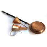 A long handled copper bed warming pan; a conical copper measure, and a copper funnel (3)