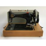 A Singer sewing machine in hard case, serial no. P923256