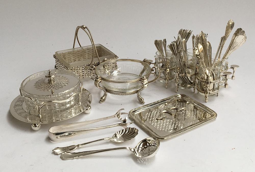 A mixed lot of sliver plated items to include a set of six coffee cups with glass liners, a number