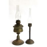 A pair of brass oil lamps, each with brass chimney, the total heights 58cmH and 53cmH