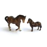 A Beswick Shetland horse, 12cmH; together with one other Beswick horse, 15cmH