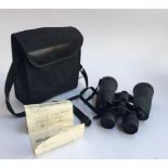 A pair of Sunagor 15x50x50 binoculars with case, instructions and tripod adapter