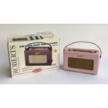 A Roberts RD50 DAB digital radio in pink