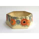 A Grays Pottery hexagonal bowl, hand painted art deco floral design with rim heightened in gilt,